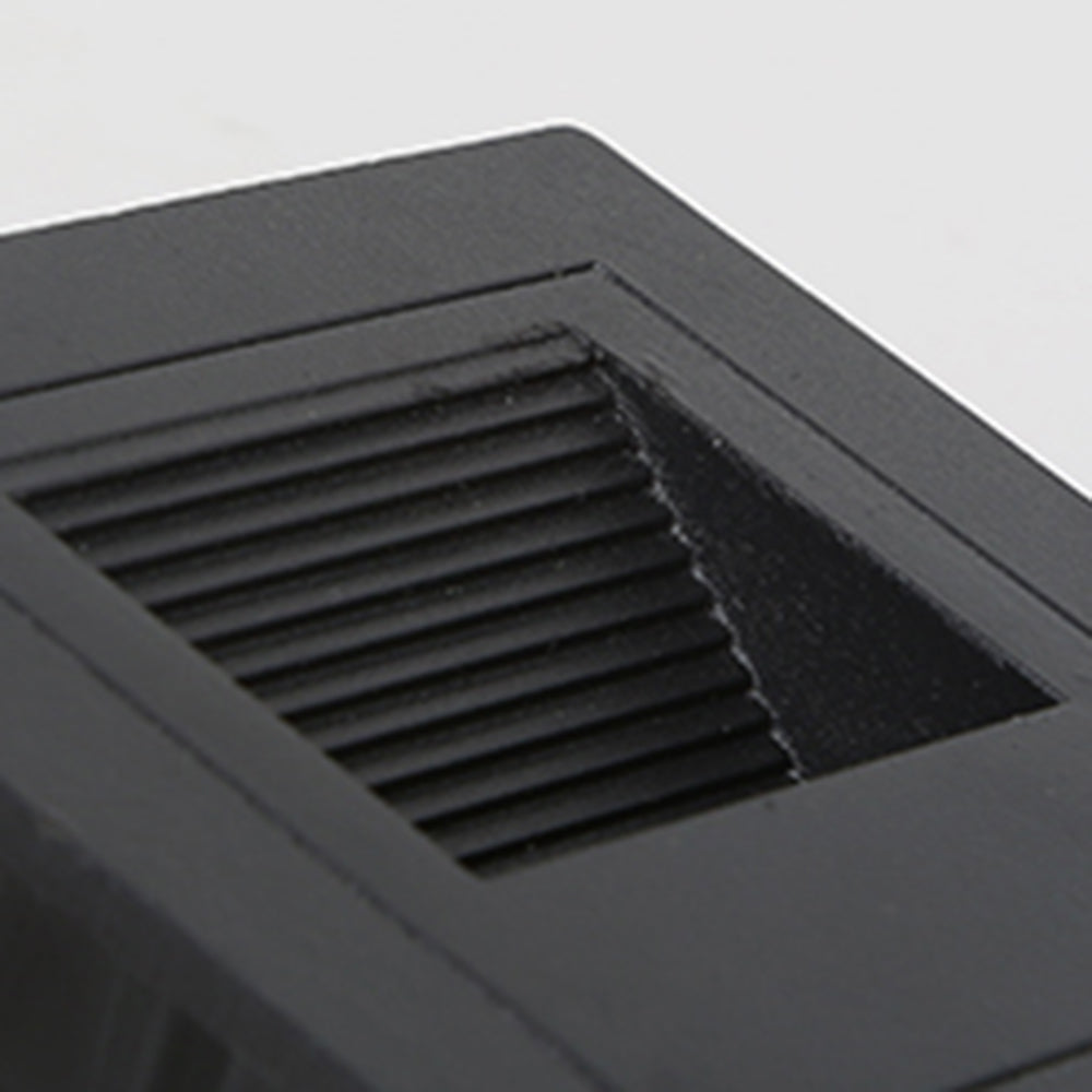 Close detail of the black louvred face of the Steva Square Outdoor Step Light
