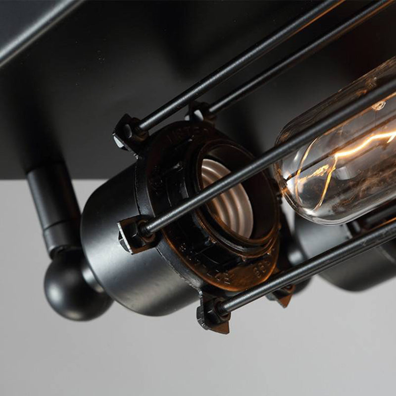 Detail of a Grindo cast black metal socket holding a tubular screw fitting bulb