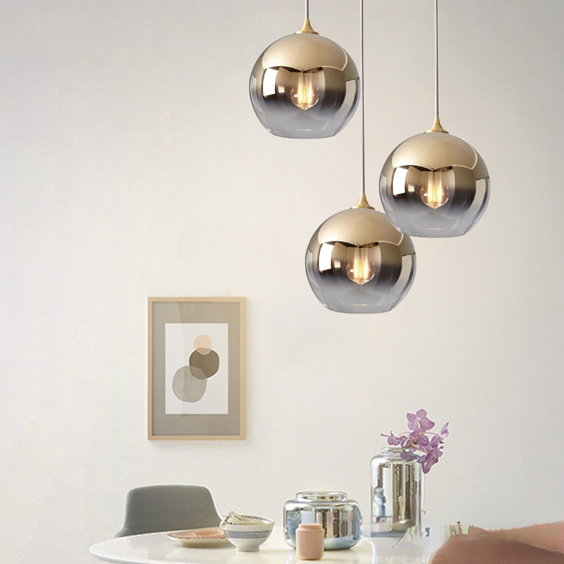 Orba gradient glass globe pendant lights in dining room