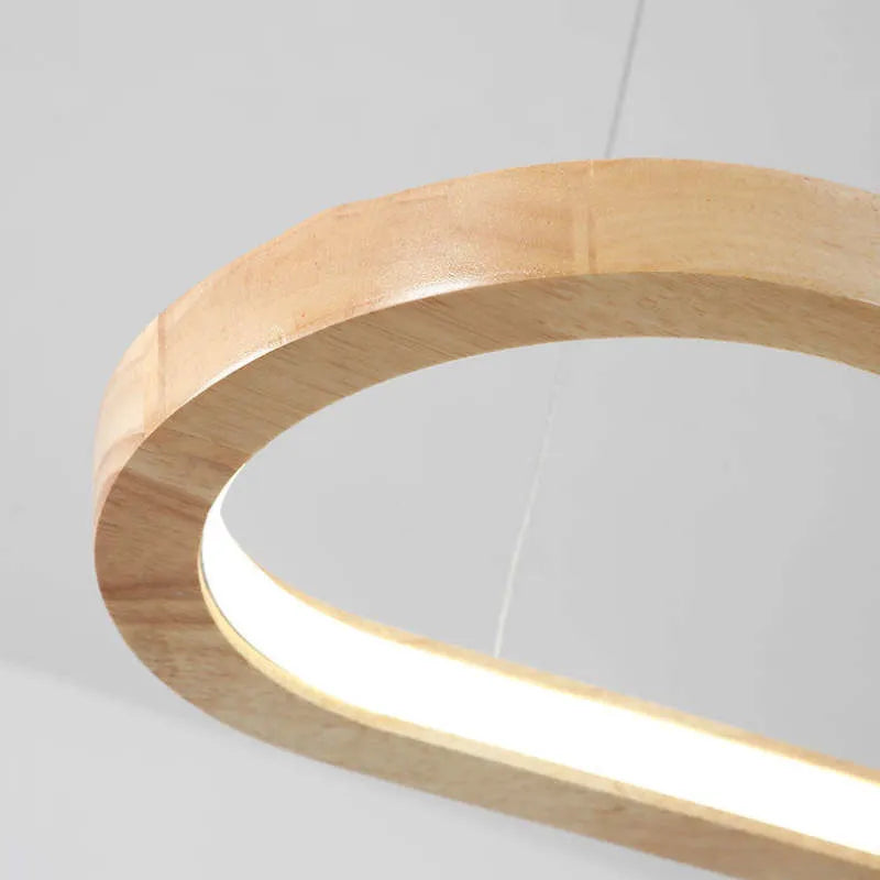 Close up of the Veona pendant light showing the natural wood grain and the acrylic diffuser strip