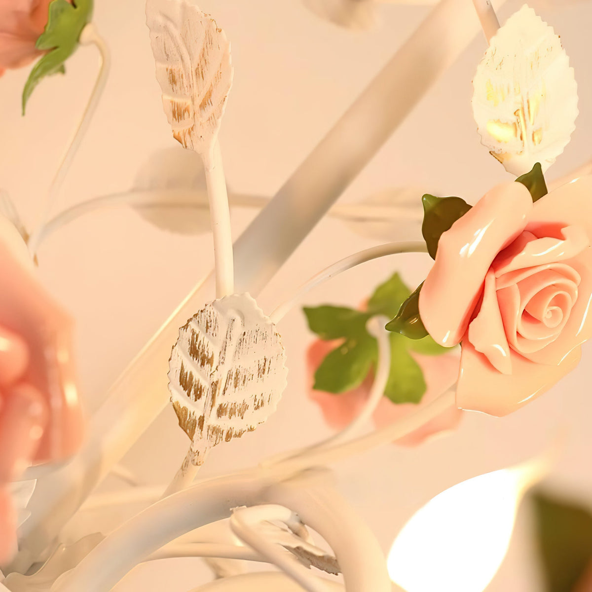 Rosven chandelier ceramic rose and iron leaf detail close-up