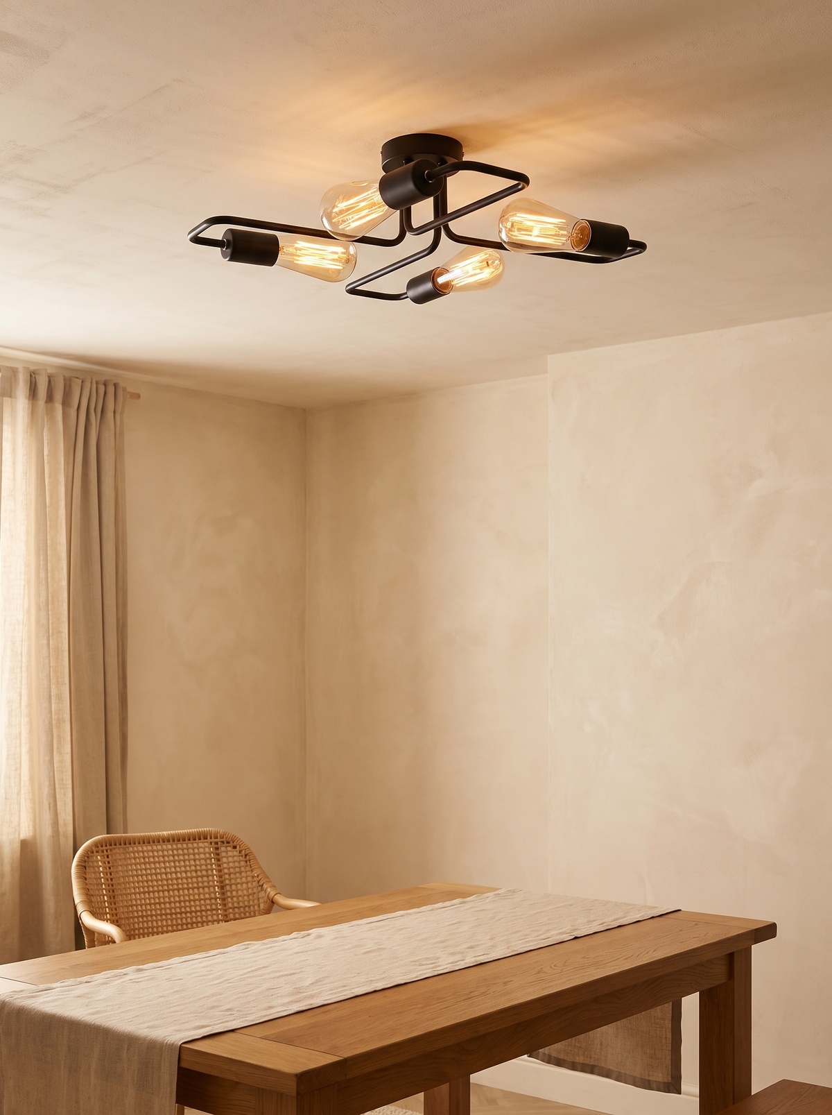 Indro Industrial Multi-Arm Ceiling Light - lifestyle scale shot above oak dining table in warm cream UK interior