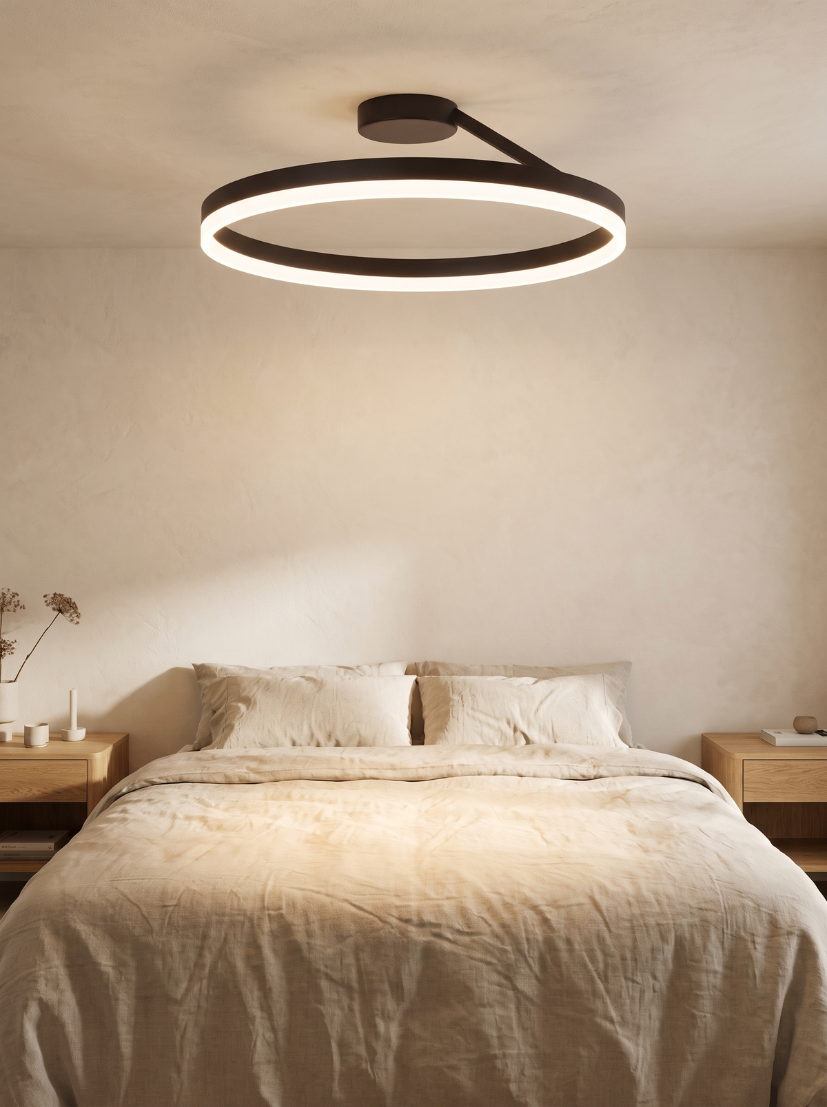 Soleno Circle Ceiling Light - lifestyle scale shot above a double bed with oat linen bedding and oak side tables in a neutral bedroom