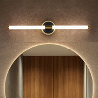 Miralo wall light lit above an arched doorway in a warm stone interior