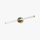 Lockhone Miralo vanity mirror wall light in brass and black on a plain white background