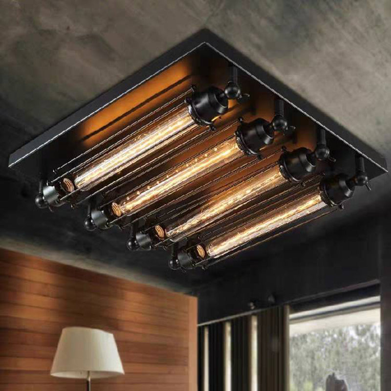 Grindo industrial ceiling light fitted to a concrete ceiling above timber panelling