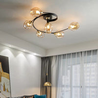 Orvello six light ceiling fitting seen against a white ceiling beside a curtained window
