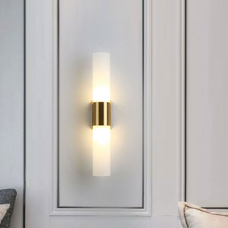 Fela twin glass wall sconce in panel hallway