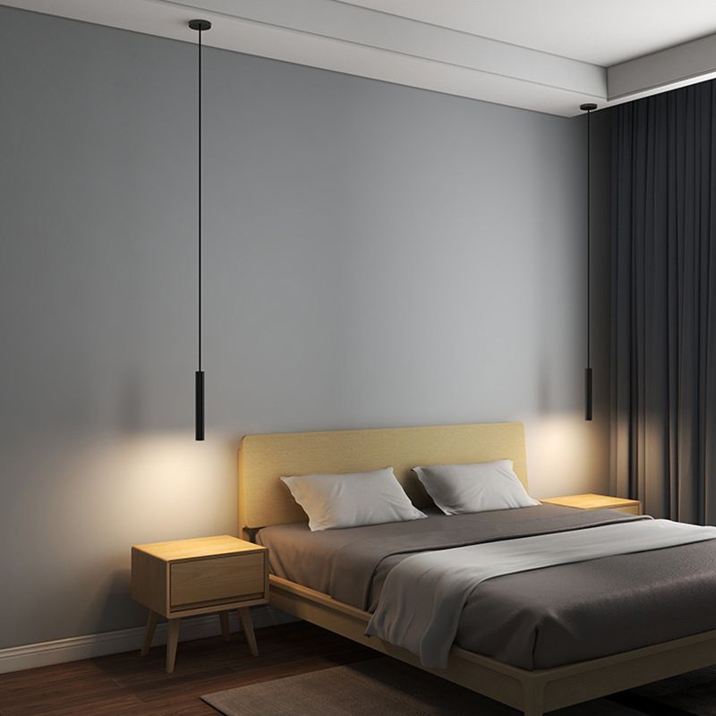 Filon Slim Linear Pendant Light hung either side of a bed in a grey bedroom