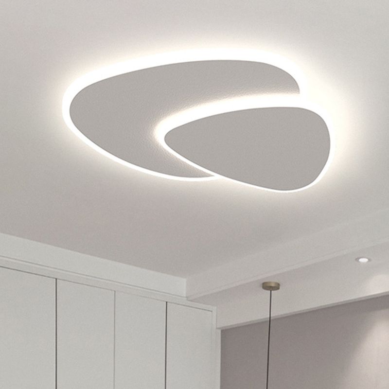 Close view of the Brindo ceiling light showing the lit gap between the two overlapping plates