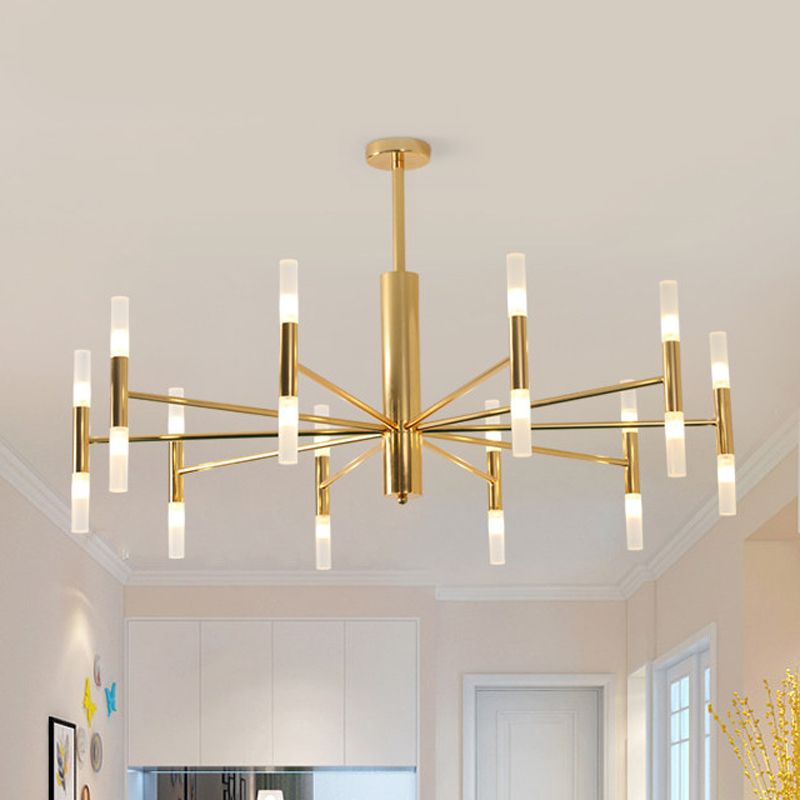 Cylma gold ceiling light seen from below in a white open plan room, showing the up and down facing tubes