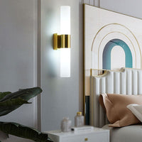 Fela sconce installed in bedroom beside wall art