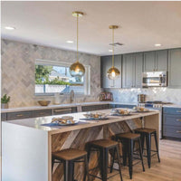 Orba gold glass globe pendants in modern kitchen lifestyle