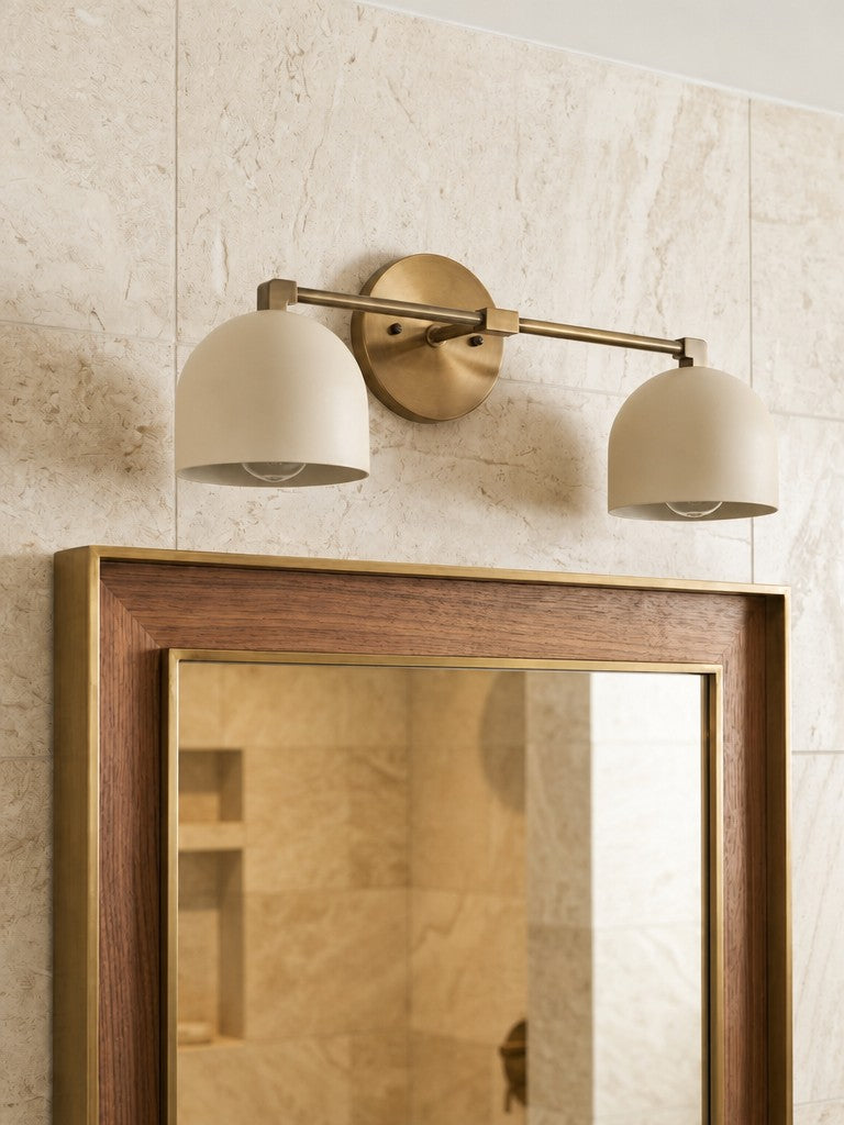 Meda dome vanity wall light mounted above a bathroom mirror