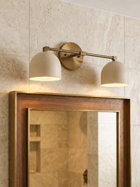Meda dome vanity wall light shown from an angle