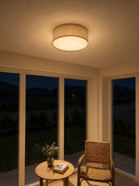 Duma ceiling light lit in the evening giving warm ambient light