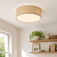Duma linen drum ceiling light in natural flax mounted flush to a white ceiling