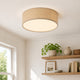Duma linen drum ceiling light in natural flax mounted flush to a white ceiling