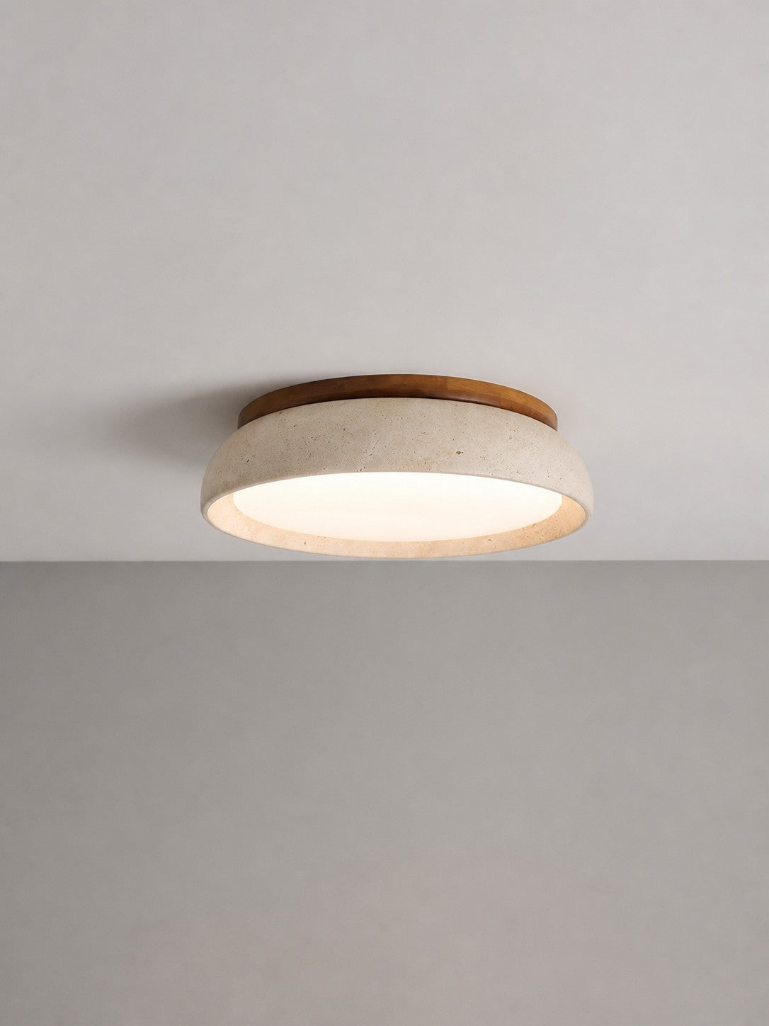Trava travertine ceiling light fitted flush to a plain ceiling