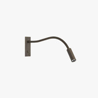 Vexo gooseneck reading wall light in bronze on a plain white background