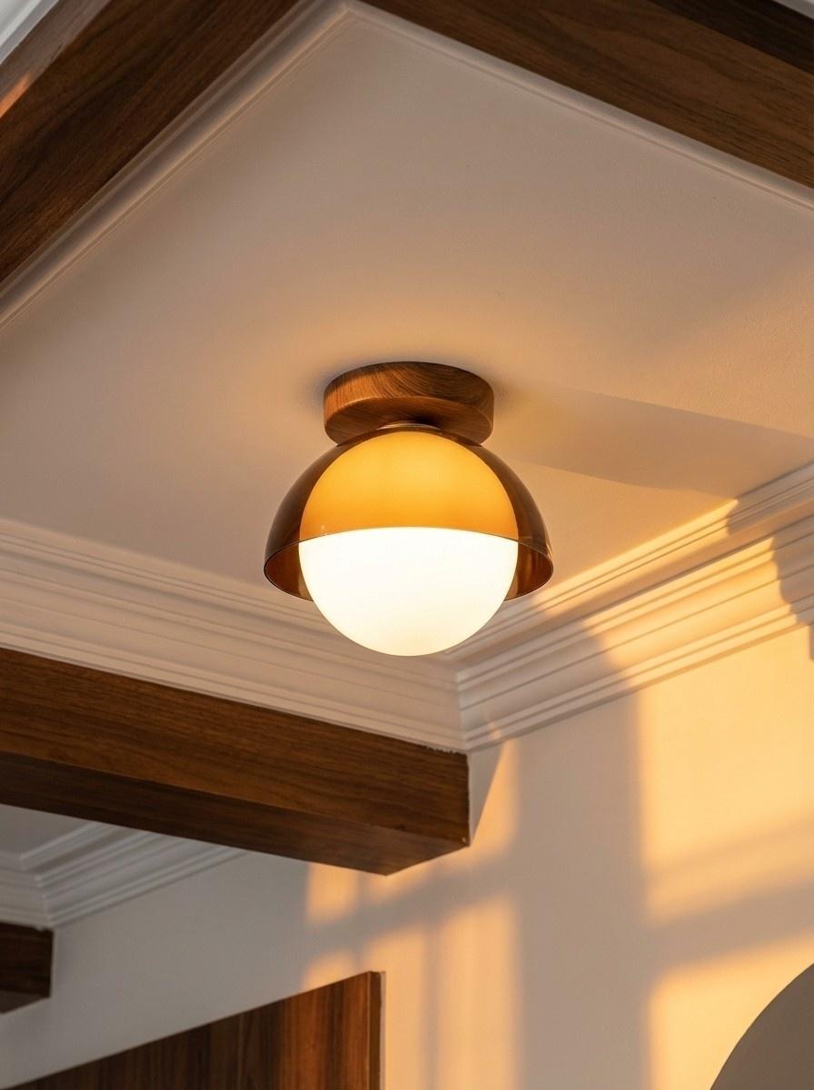 Suno ceiling light lit, casting warm amber light across a white ceiling and wood beam