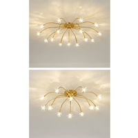 Nevaro gold starburst ceiling light mounted on a white ceiling in a room with a green wall and sheer curtains