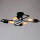 Lockhone Indro industrial multi-arm ceiling light in matte black on a plain background