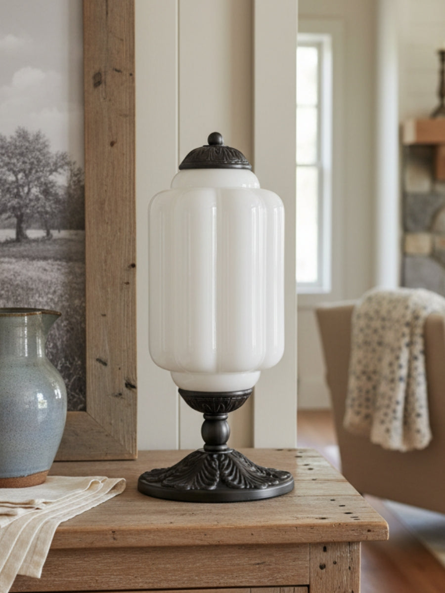 Elva glass table lamp on a reclaimed wood table in a country style living room