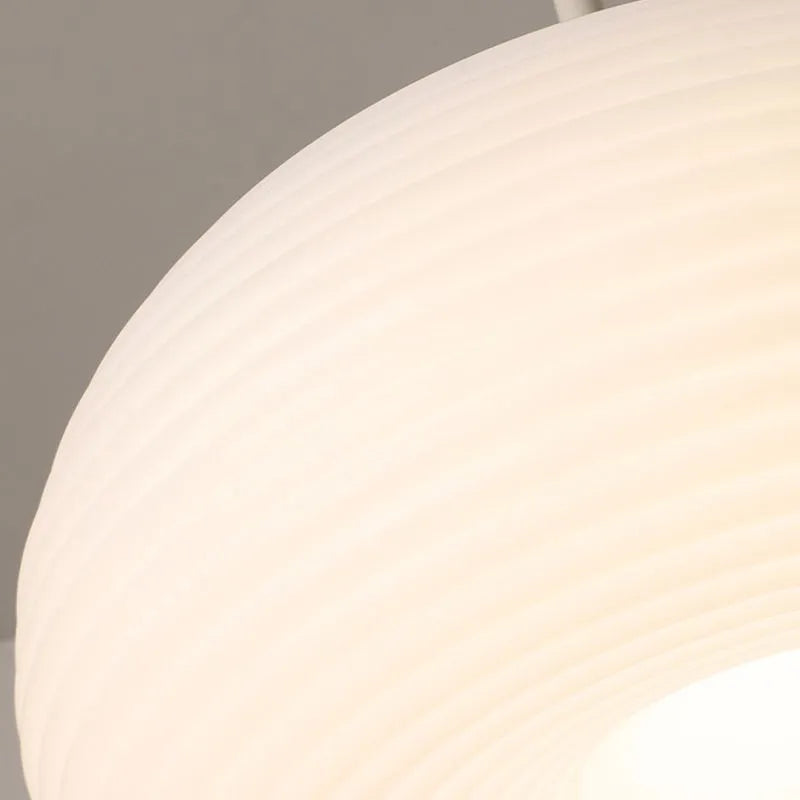 Close detail of the ribbed acrylic surface on the Ombia pendant shade
