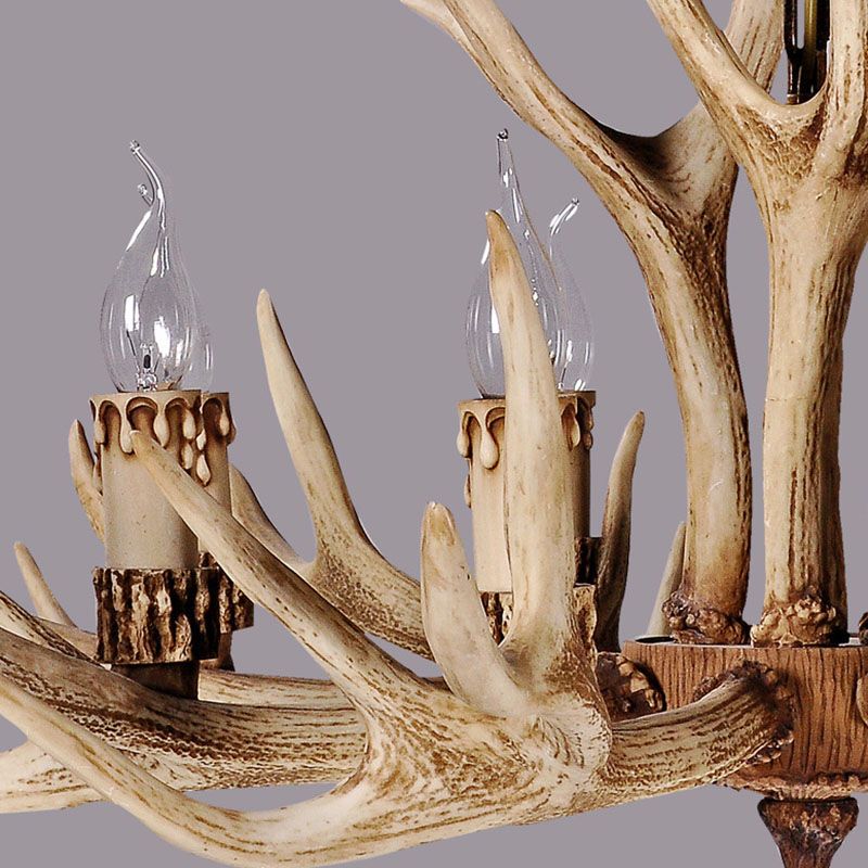 Close-up of the moulded resin antler arms and candle sleeve on the Stagra chandelier