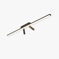 Vixa linear spotlight ceiling bar in matt black with two brass tipped adjustable spot heads on a plain background