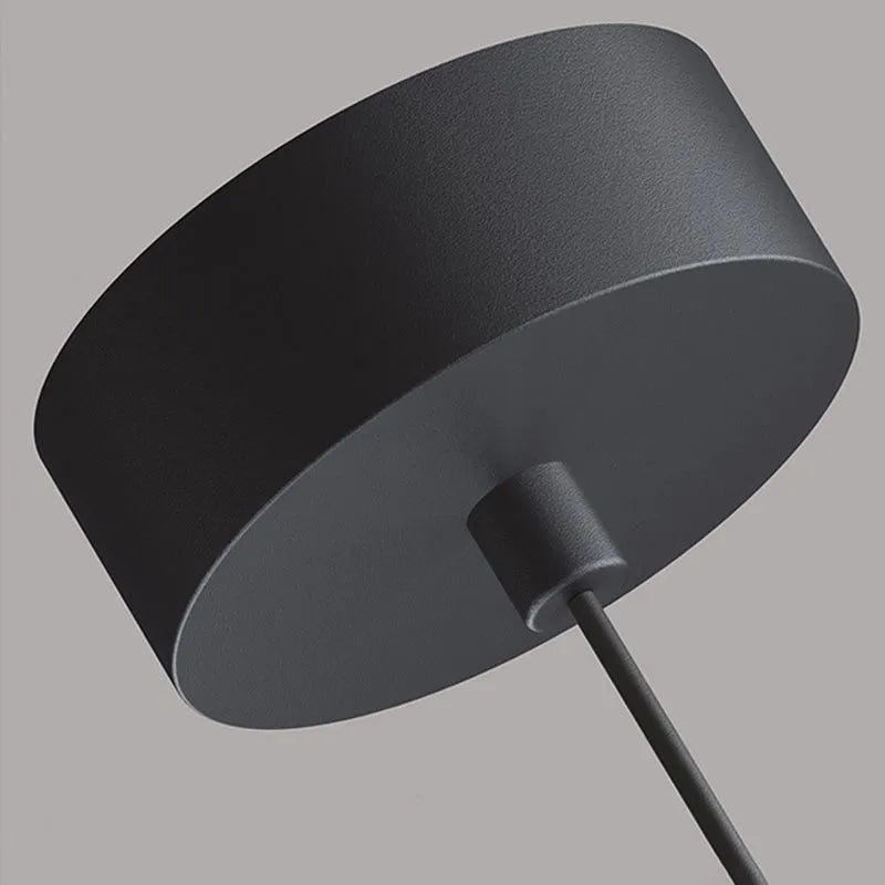 Close view of the Filon Slim Linear Pendant Light ceiling canopy in matt black