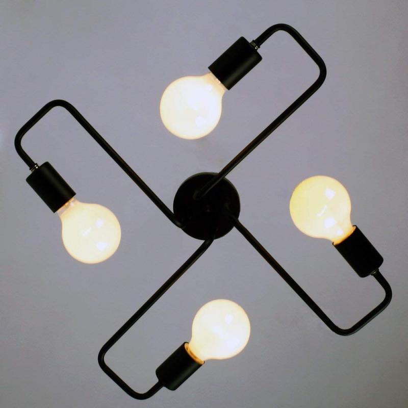 Indro ceiling light viewed from below showing four looped black arms and globe bulbs