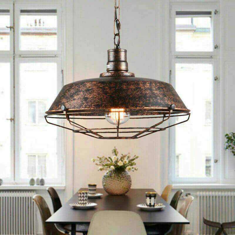 Vorden Industrial Cage Pendant Light over dining table, rustic interior