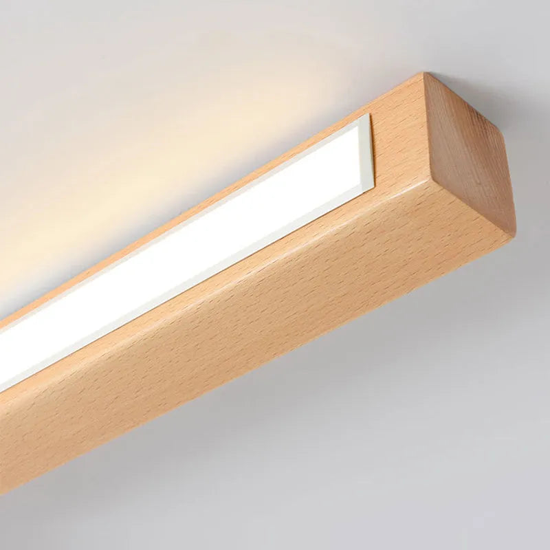 End of the Woda wood ceiling bar lit, showing the slim 4.5cm profile