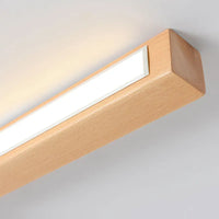 End of the Woda wood ceiling bar lit, showing the slim 4.5cm profile