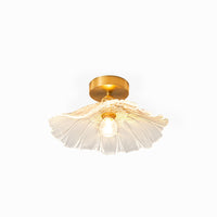Calo petal glass ceiling light with clear ribbed shade and brass canopy on a plain white background