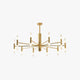 Cylma cylinder cluster ceiling light in gold on a white background, ten radial arms carrying twenty frosted tubes