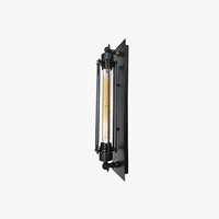 Trono cylinder wall light in black on a white background, steel rod cage over a tubular filament bulb