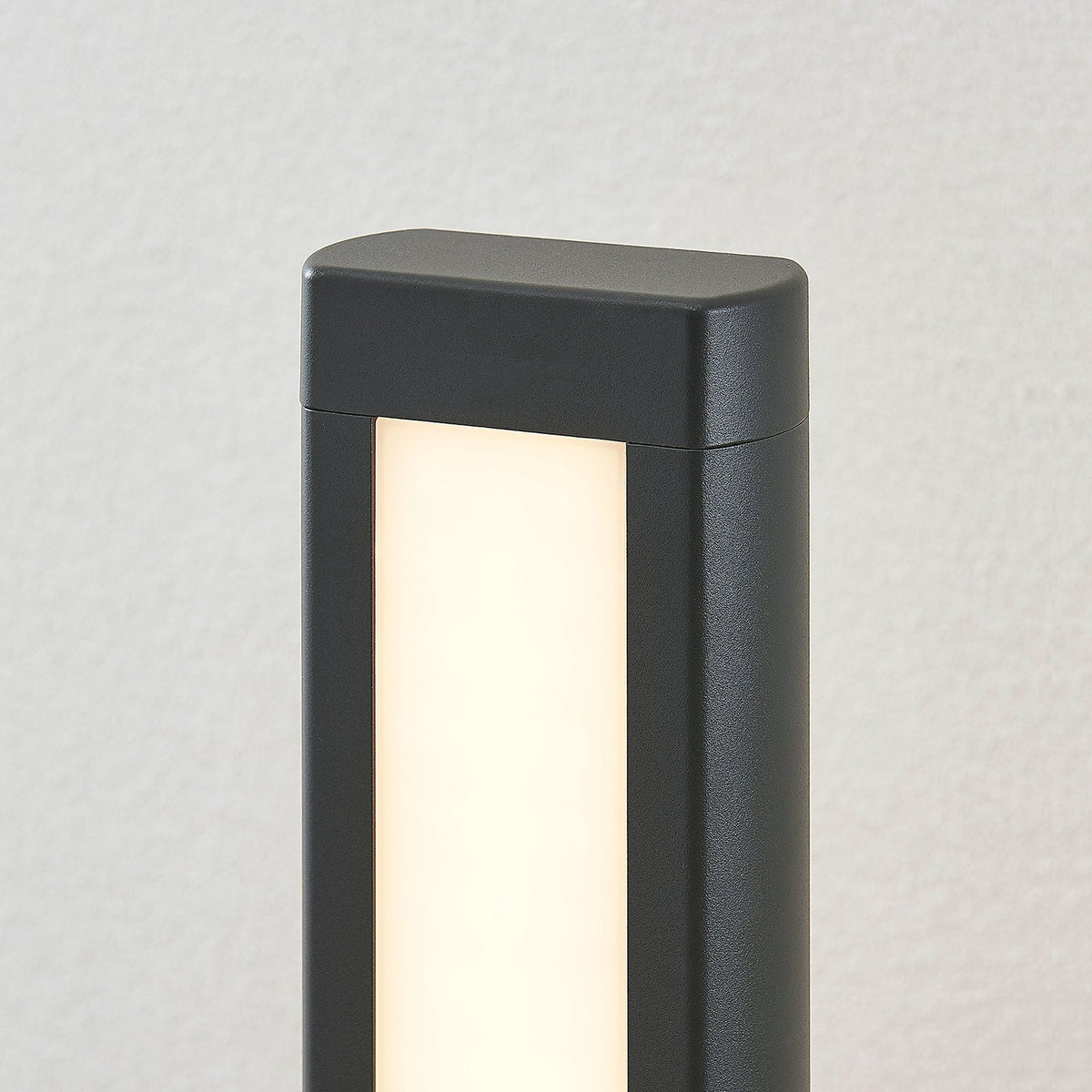 Close view of the Mairo light head showing the acrylic diffuser panel and rounded top