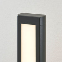Close view of the Mairo light head showing the acrylic diffuser panel and rounded top