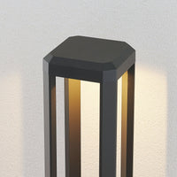 Close view of the Ryda chamfered cap and the lit inner faces of the anthracite frame