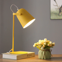 Bucket lamp on bedside table