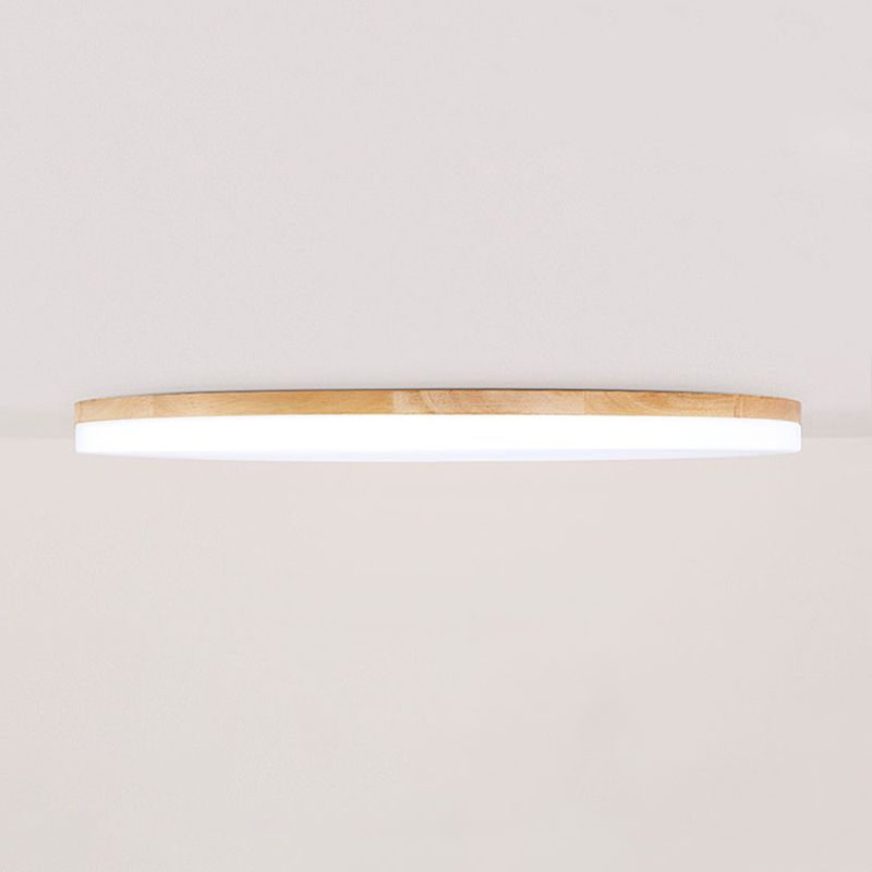 Side profile of the Nolla ceiling light showing how shallow the wood rimmed disc sits against the ceiling