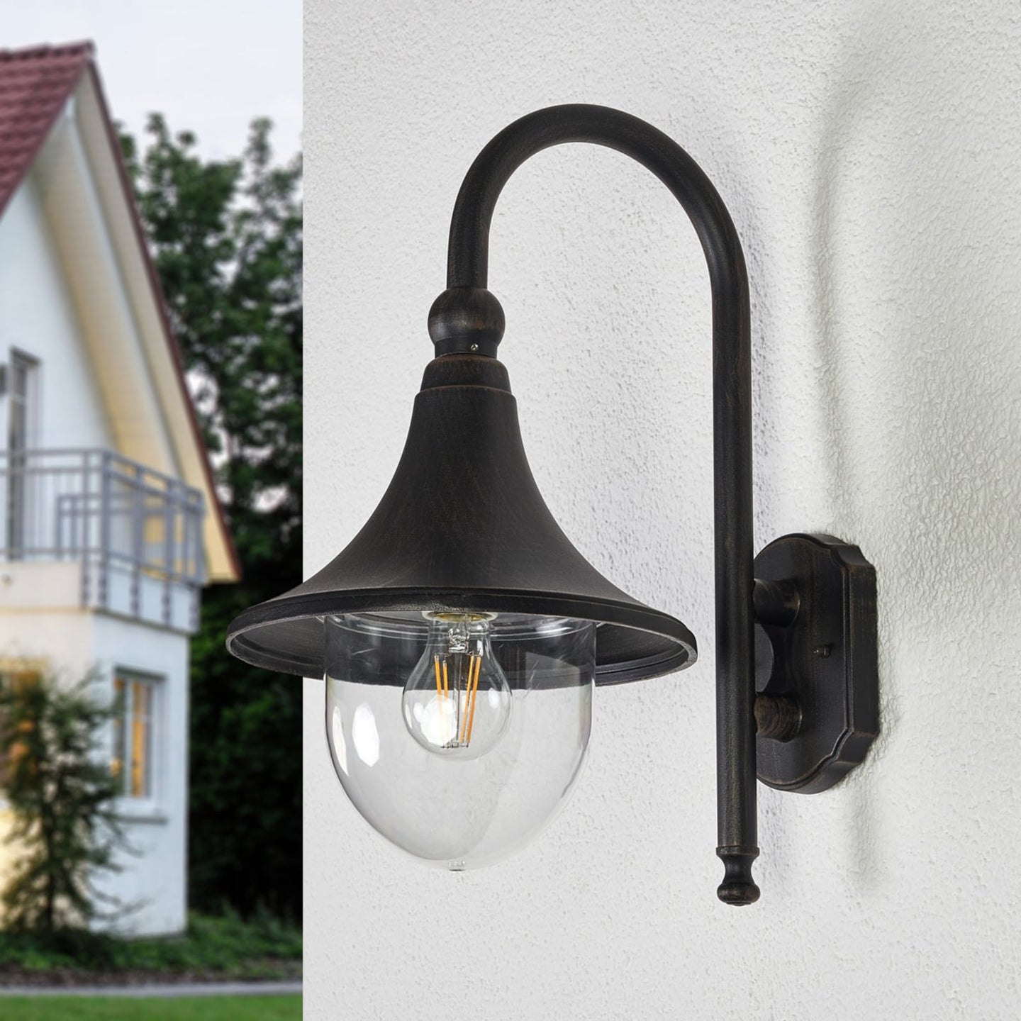 Side view of the Dafo antique outdoor wall light against a pale grey background showing the wall plate and projection