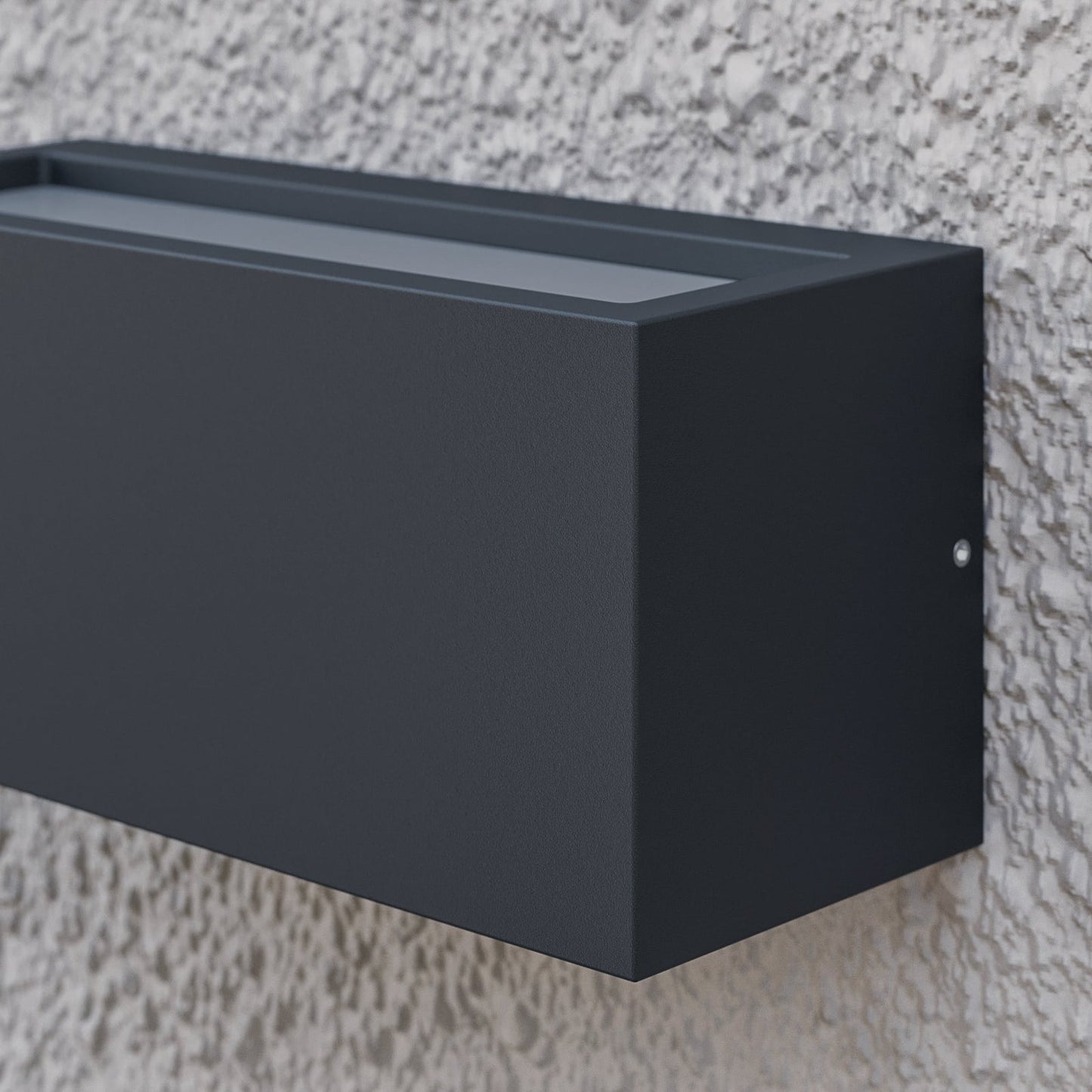 Close-up of the top of the Bexa outdoor wall light showing the upper diffuser strip that throws light up the wall