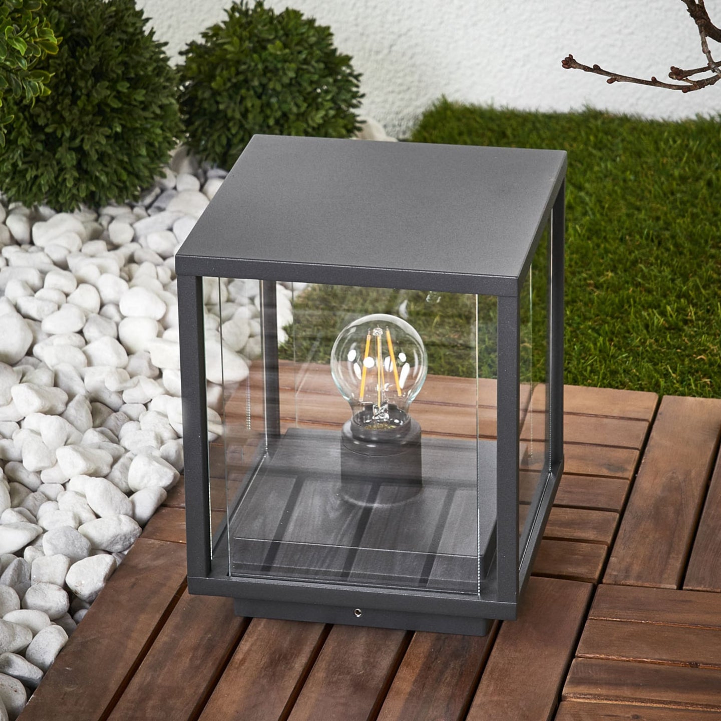 Anle Glass Pillar Light in daylight showing the clear glazed sides and anthracite frame