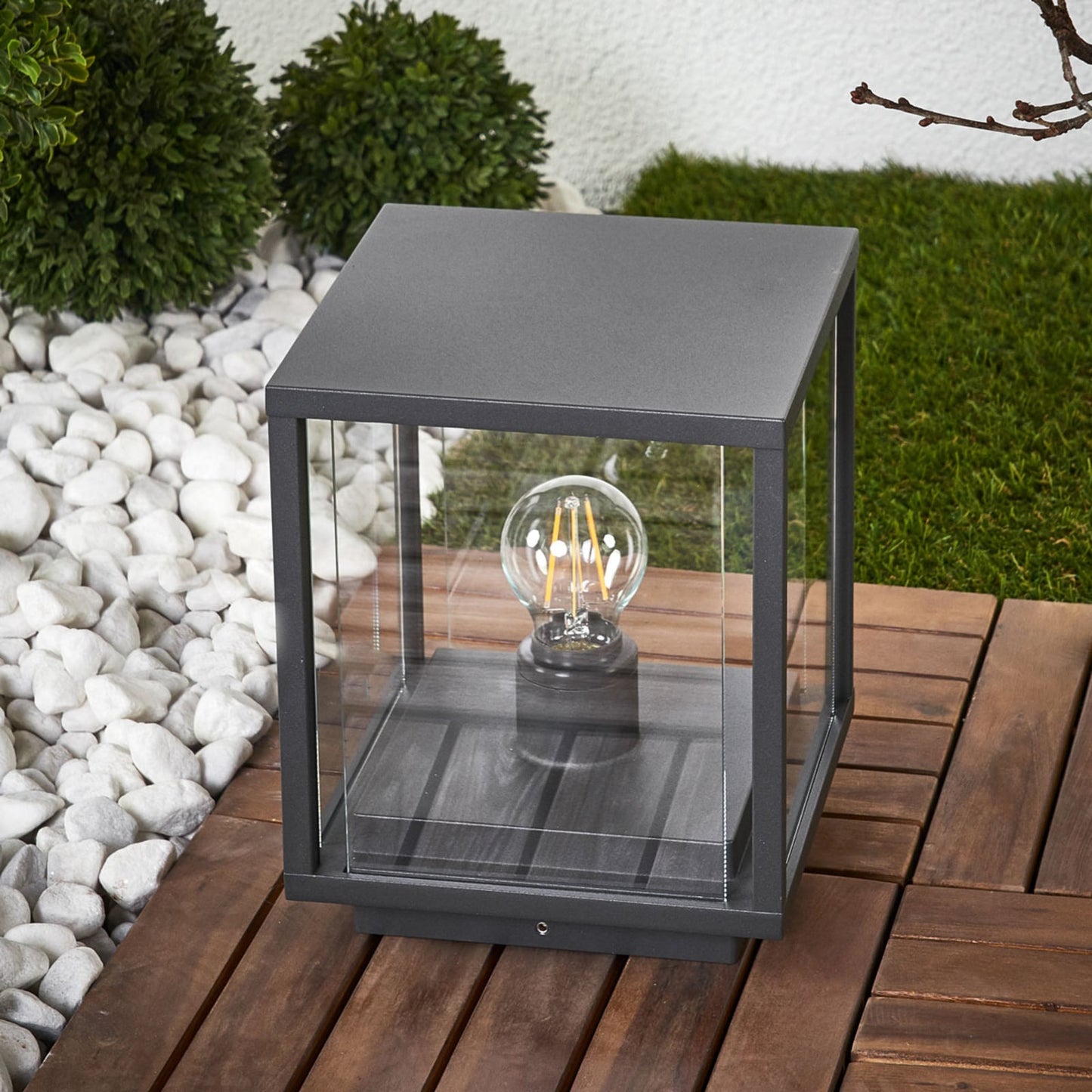Anle Glass Pillar Light in daylight showing the clear glazed sides and anthracite frame