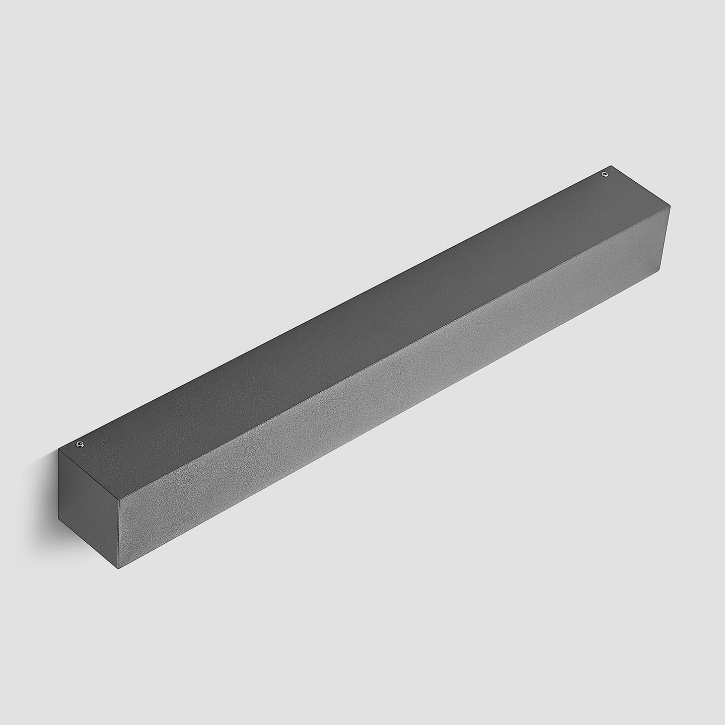Rear three quarter view of the Lino Column outdoor wall light on a plain grey background, showing the closed anthracite housing