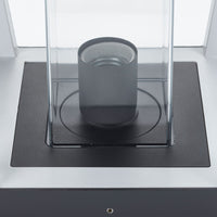 Close detail of the Dunara E27 lamp holder mounted on the black base plate